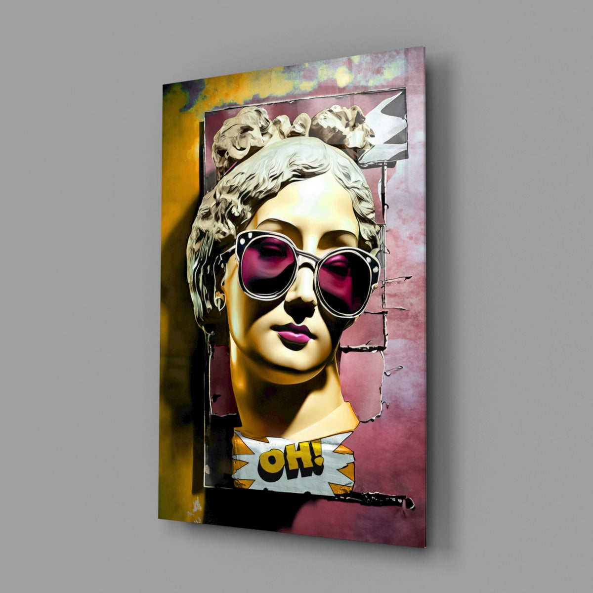 Gold bust in sunglasses on torn pink wall glass wall art angled against a soft gray backdrop