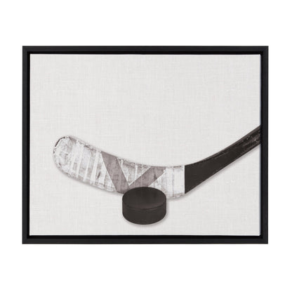 Horizontal hockey stick and puck framed canvas wall art in black frame, easy to hang