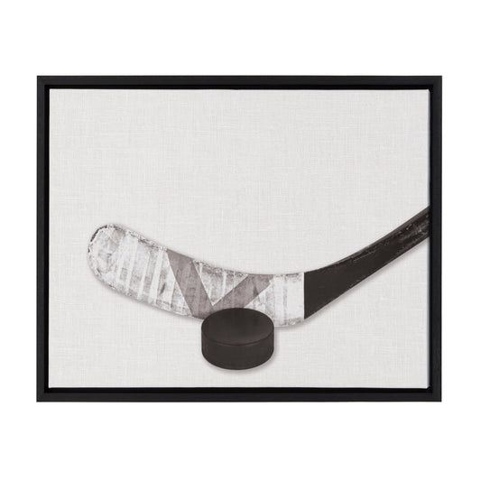 Horizontal hockey stick and puck framed canvas wall art in black frame, easy to hang