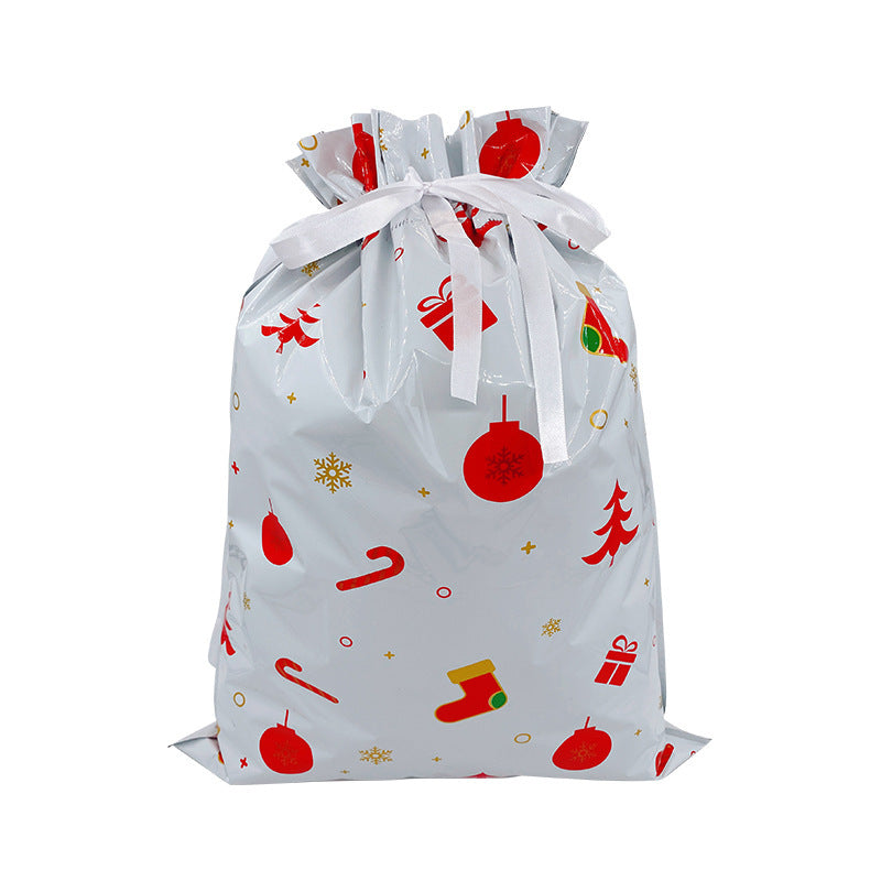 White drawstring bag with red Christmas-themed patterns on a white background