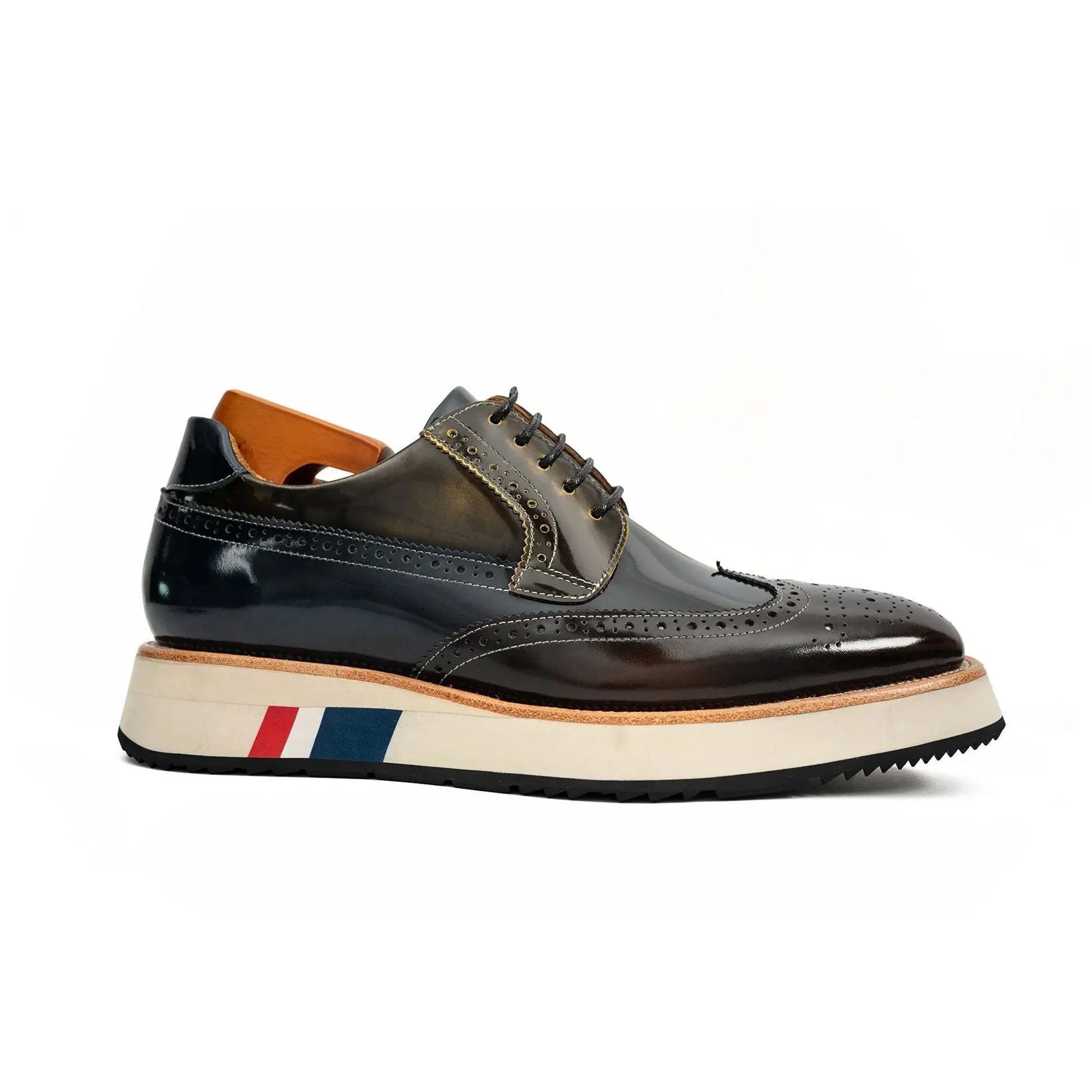 handmade leather brogue shoes with white and tricolor striped platform sole side view
