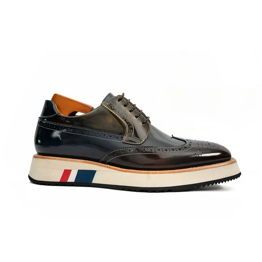 handmade leather brogue shoes with white and tricolor striped platform sole side view