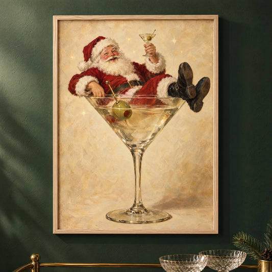 Vintage Santa lounging in a giant martini glass, framed in natural pine on a deep green wall above a brass bar cart