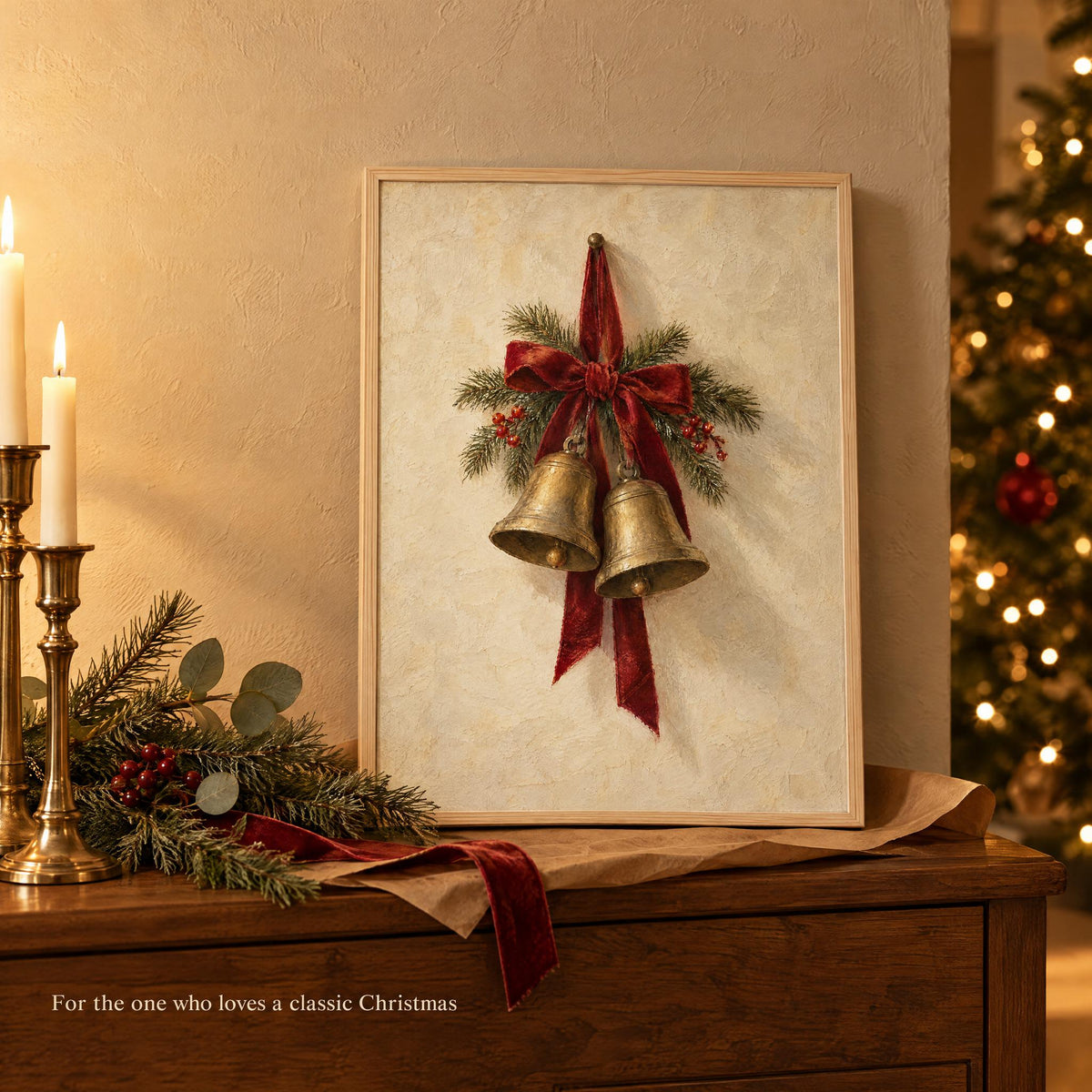 Framed Christmas bells art on a sideboard with kraft paper, red ribbon and a lit tree, a classic Christmas gift