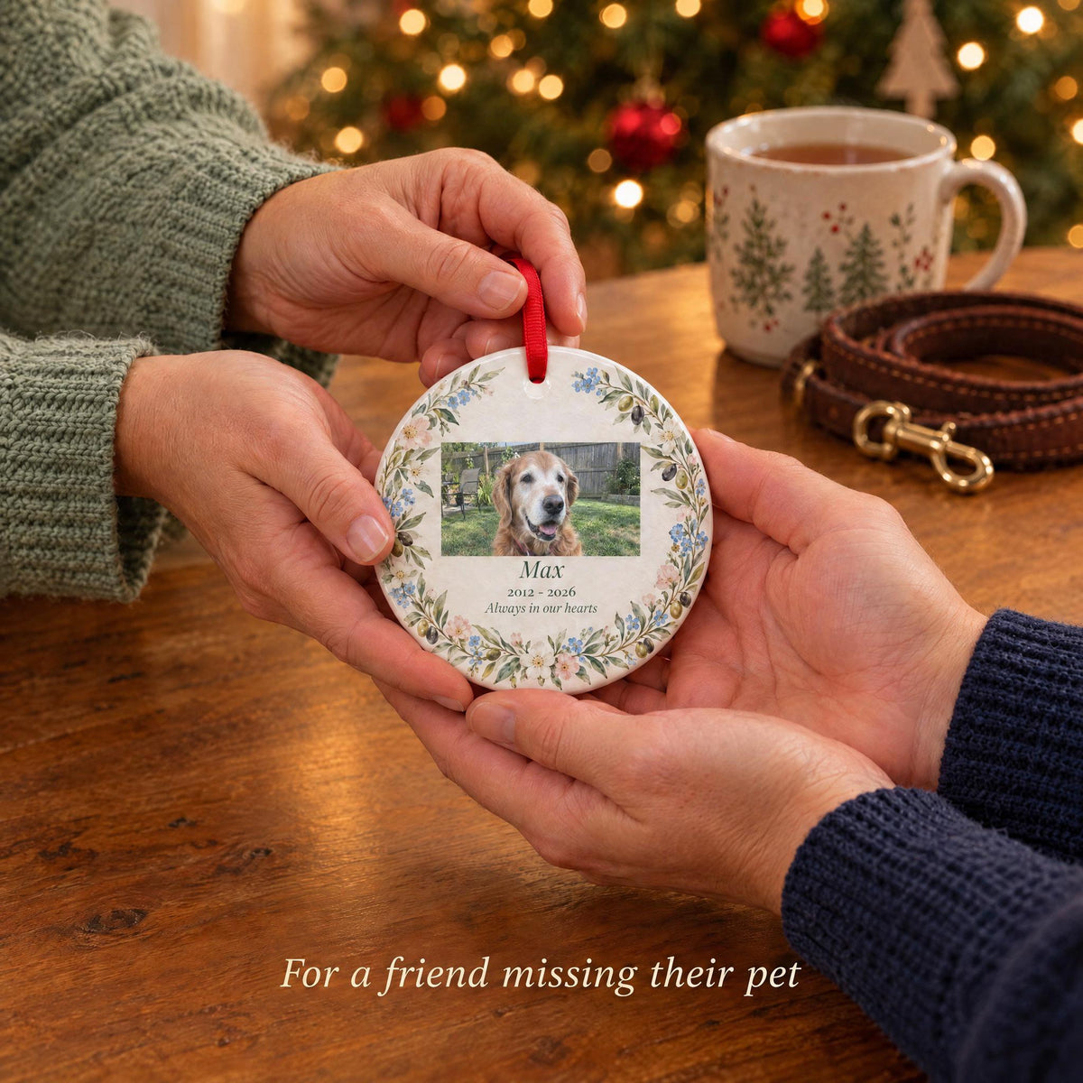 A friend giving a personalized dog memorial ornament, a pet loss sympathy gift at Christmas