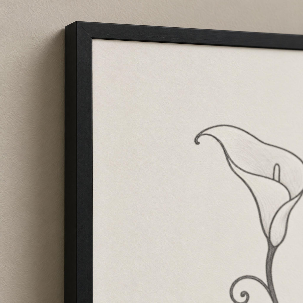 Close-up of the black pine frame corner and the charcoal calla lily line on pale matte paper