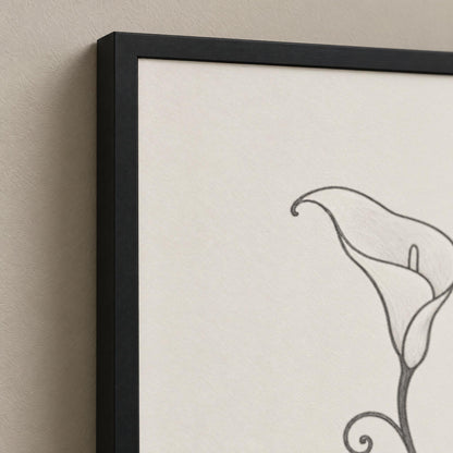 Close-up of the black pine frame corner and the charcoal calla lily line on pale matte paper