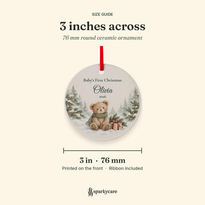 Size guide: the round ceramic baby ornament is 3 inches, 76 mm, across, printed on the front, ribbon included