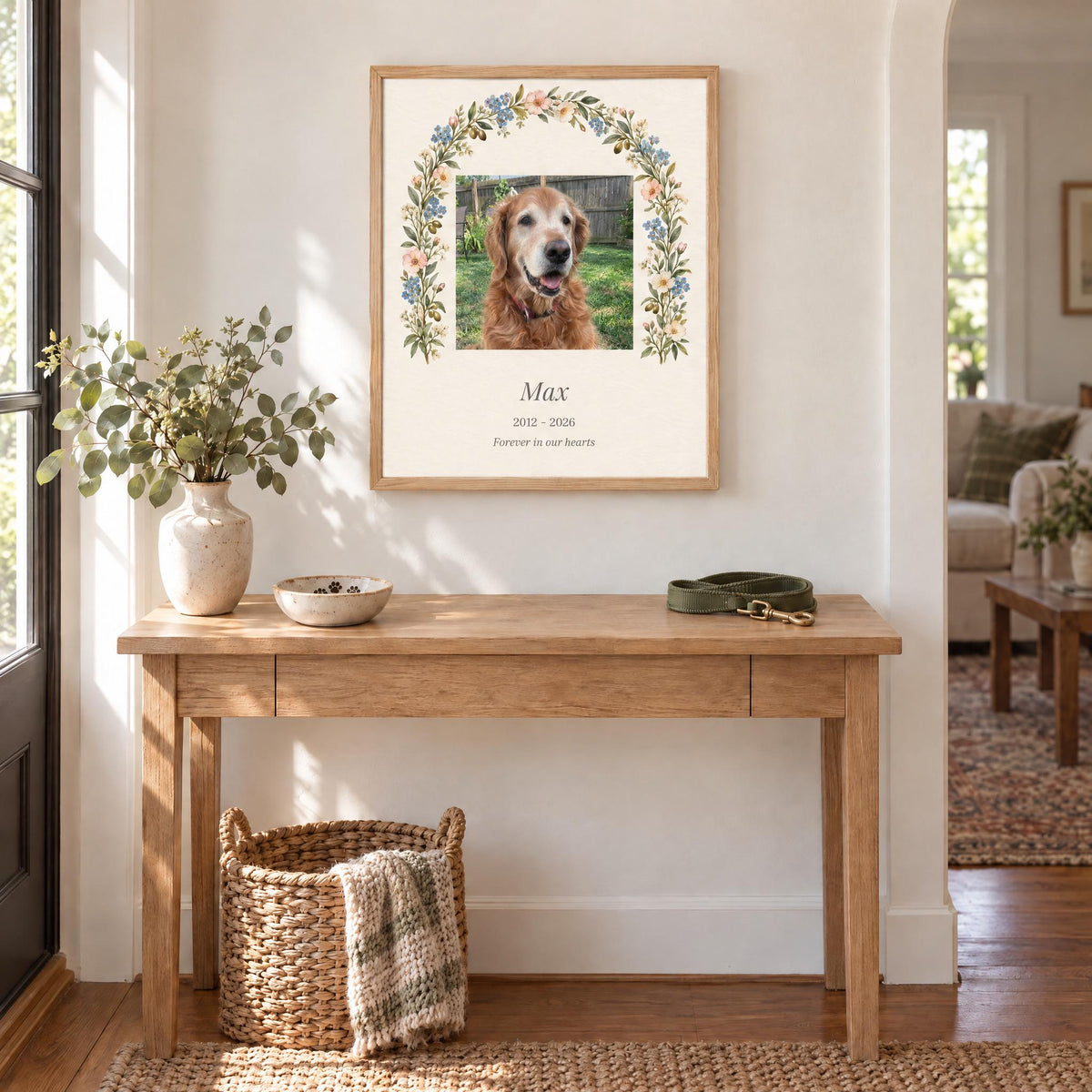 Dog remembrance print in a wood frame hung above an entryway console, shown to scale in a real room