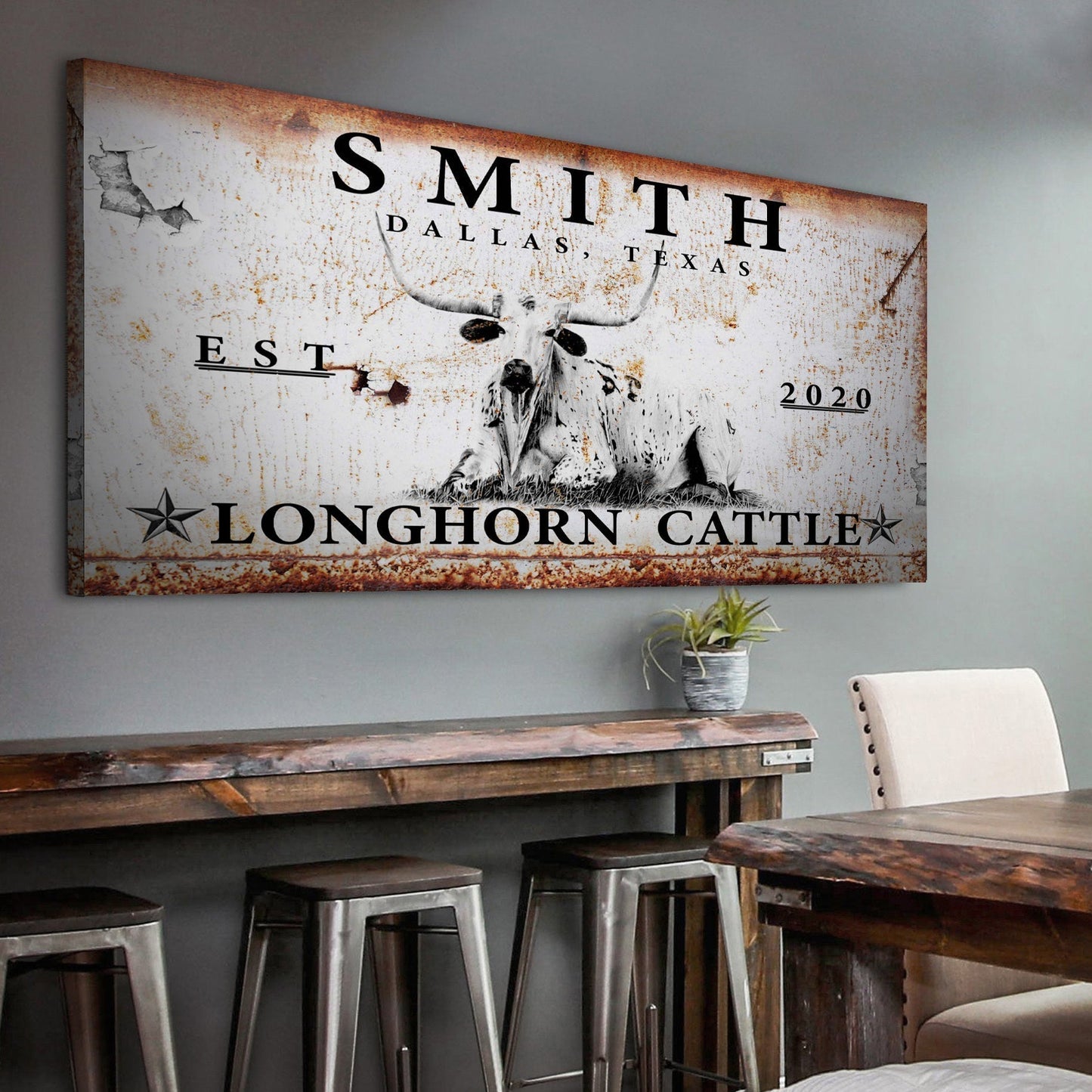 Longhorn rustic cattle canvas wall art in a ranch office