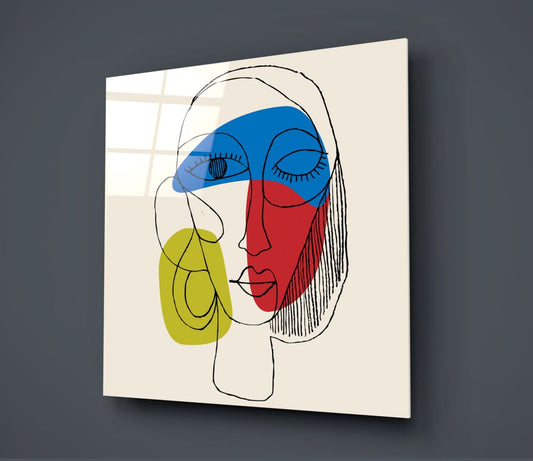 Abstract line art face square glass wall art on a dark gray wall