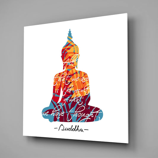 Buddha quote on white square glass wall art on a gray wall with a window reflection in the glass