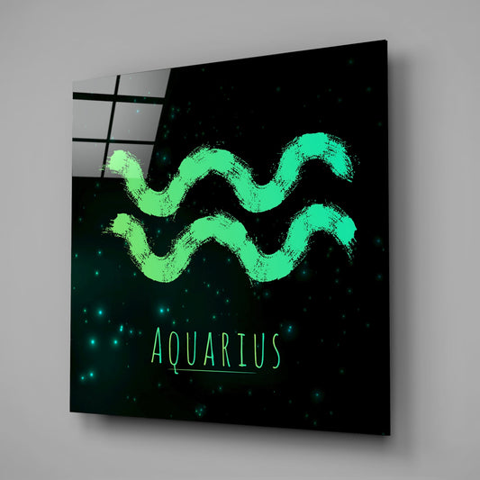 Aquarius brushstroke zodiac glass wall art on a gray wall, a window reflected in the glossy front