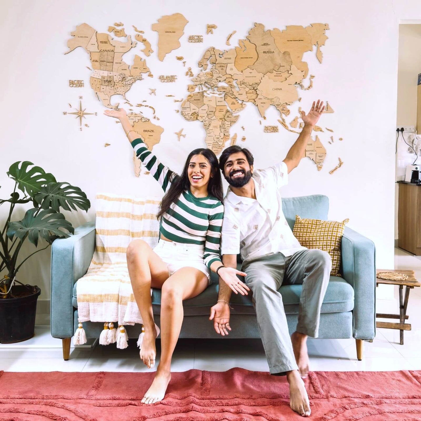 3D wooden world map wall art in a light palette