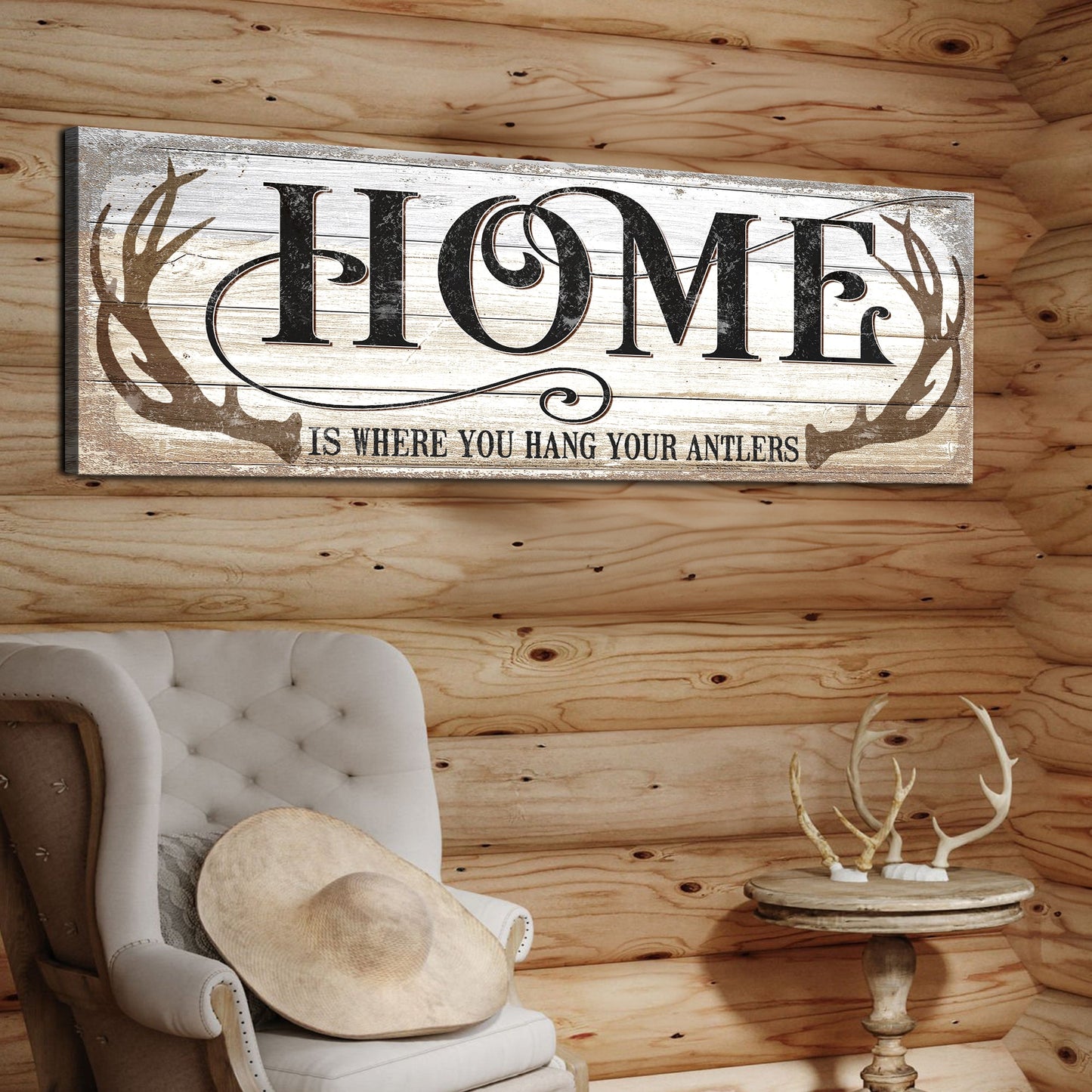 Home Is Where You Hang Your Antlers canvas wall art with antler art and rustic saying on gallery-wrapped canvas for cabin decor