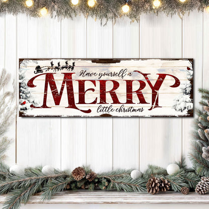 Red plaid Merry Little Christmas sign canvas shown in a styled room setting, view 2