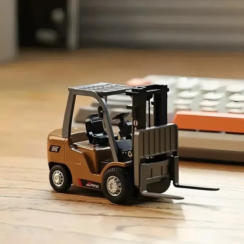 Small toy forklift on a wooden surface with a blurred background