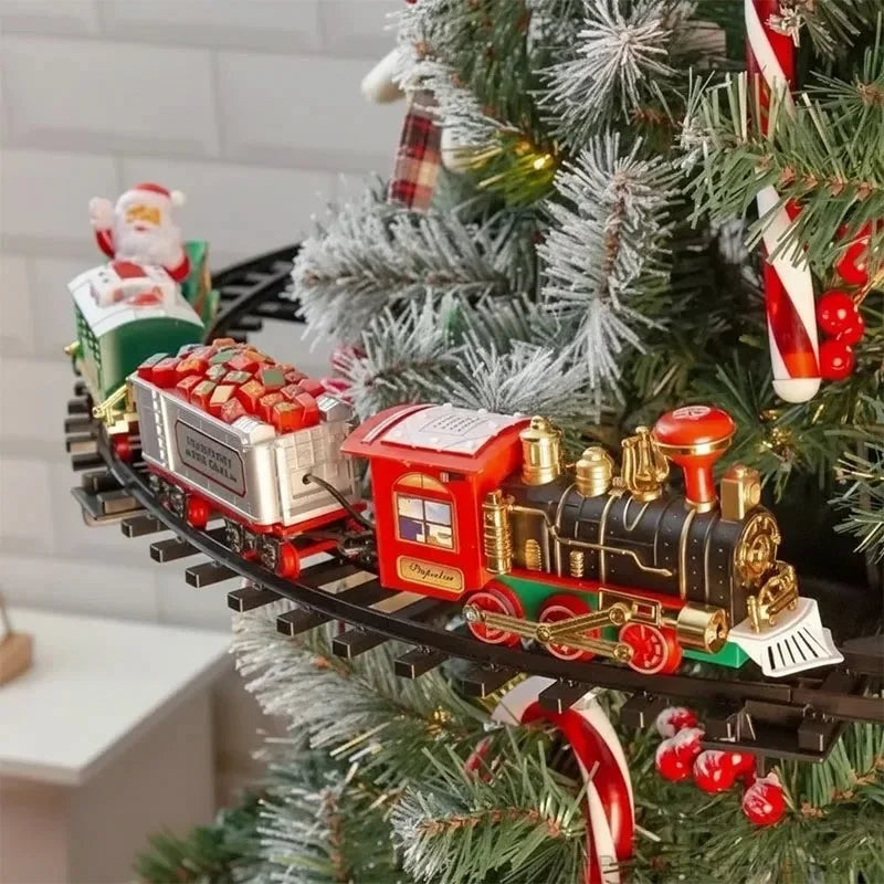 Toy train set on a Christmas tree with decorations
