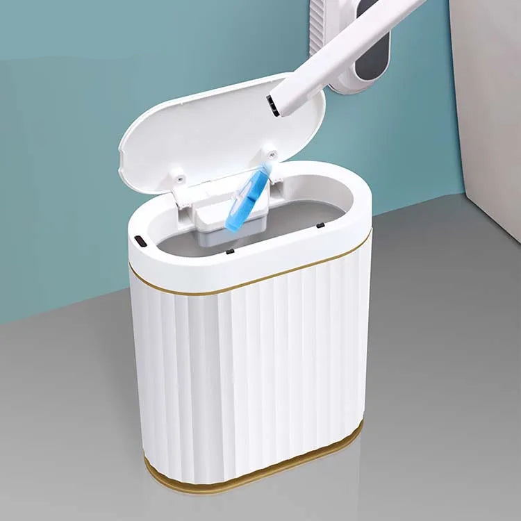 Touch-free button releases used toilet brush head into bin