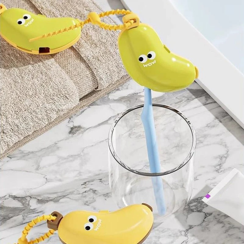 Yellow pear-shaped cup with a blue straw on a marble surface