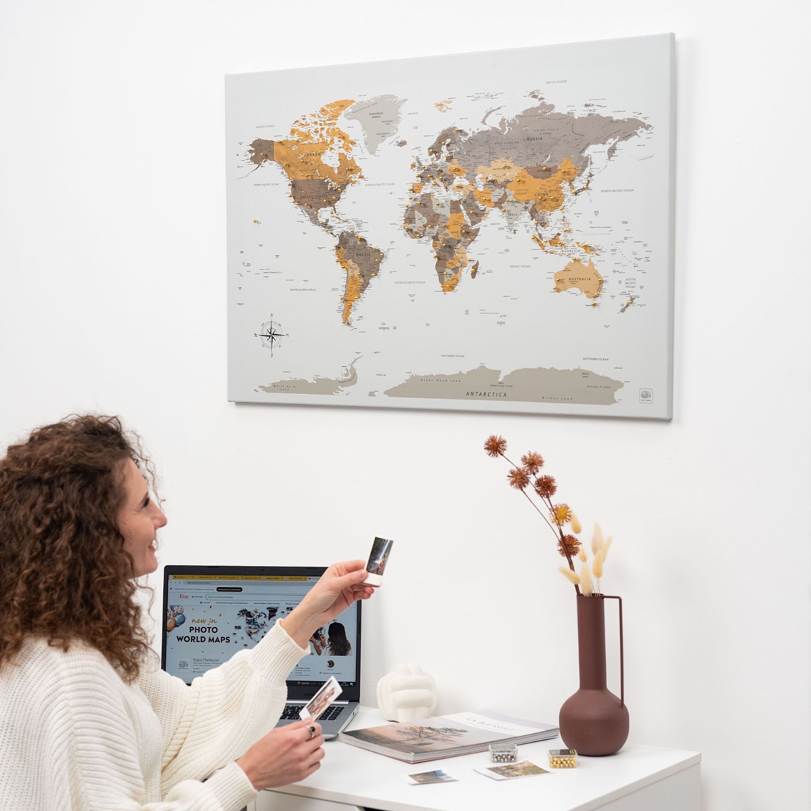 Desert-toned world map canvas wall art in a pine wood frame