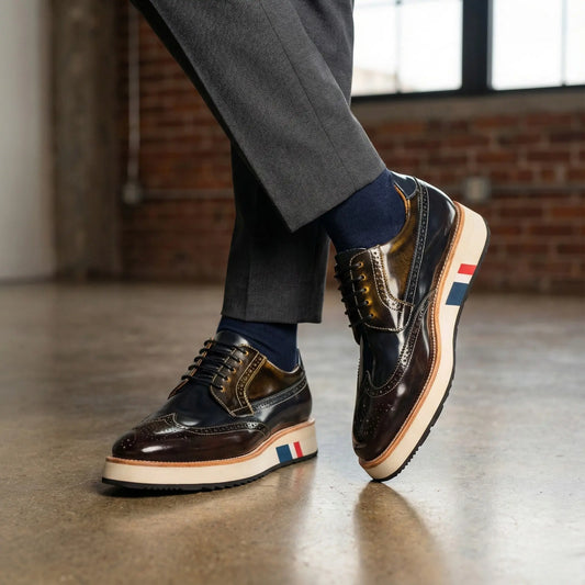 mens dress brogue shoes angled view highlighting platform heel and red blue stripe