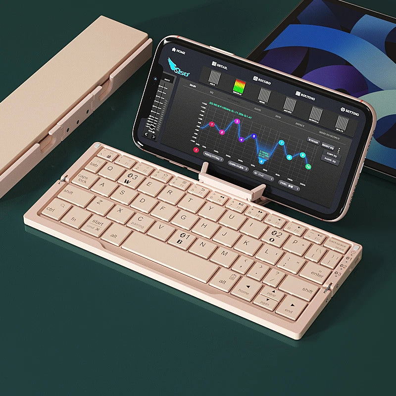 mini keyboard paired to smartphone on built-in stand