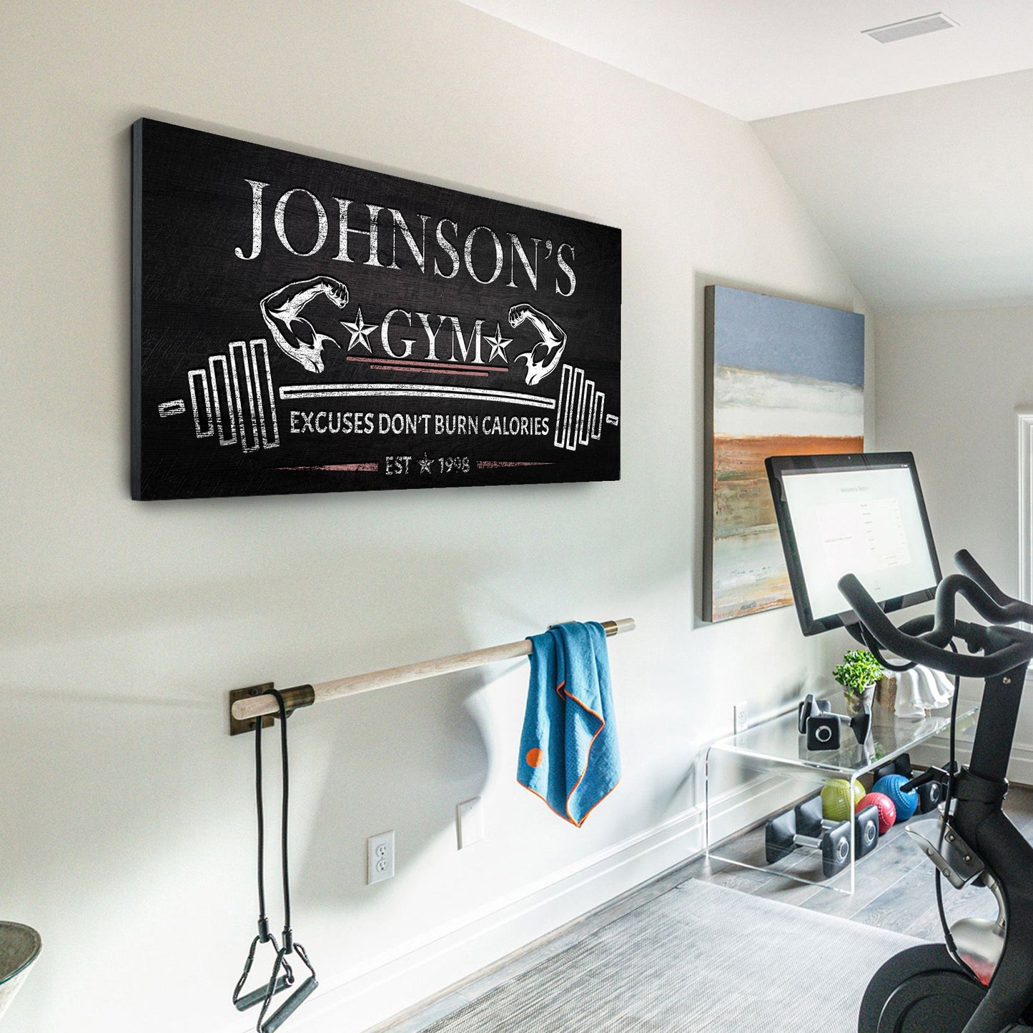 Home gym motivation canvas wall art in a garage workout space