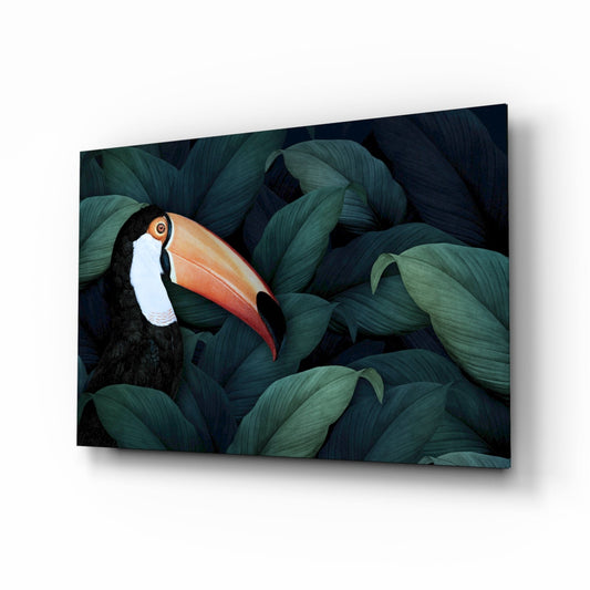 Toucan glass wall art among teal jungle leaves