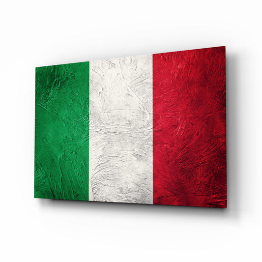 Italy flag with green, white and red vertical bands and a rough, weathered surface, on glass