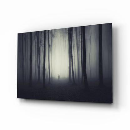Lone figure in dark misty woods glass wall art