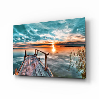 Lake dock sunset glass wall art in teal and amber
