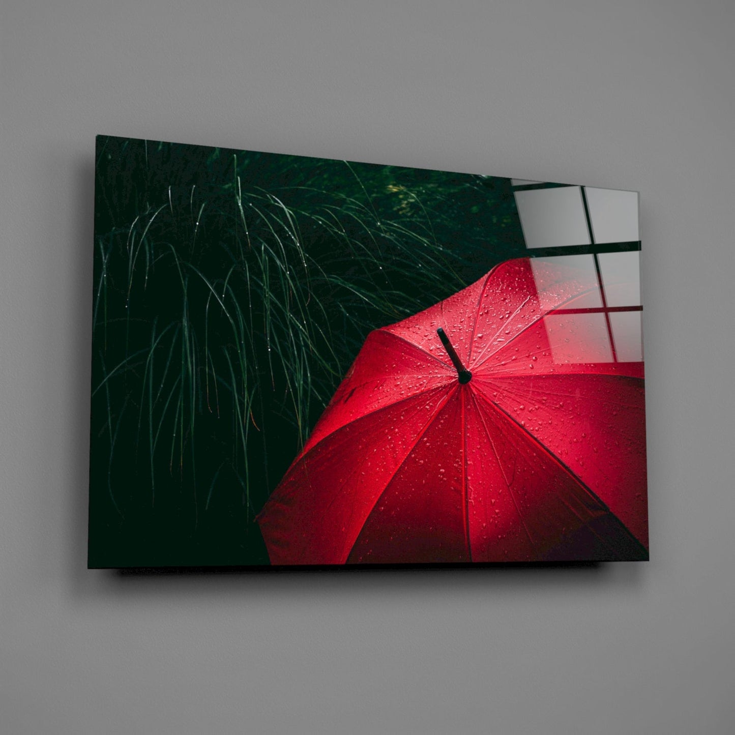 Red Umbrella in Dark Green Grass Glass Wall Art
