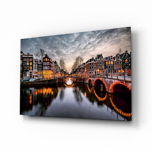 Amsterdam canal twilight glass wall art in amber and slate
