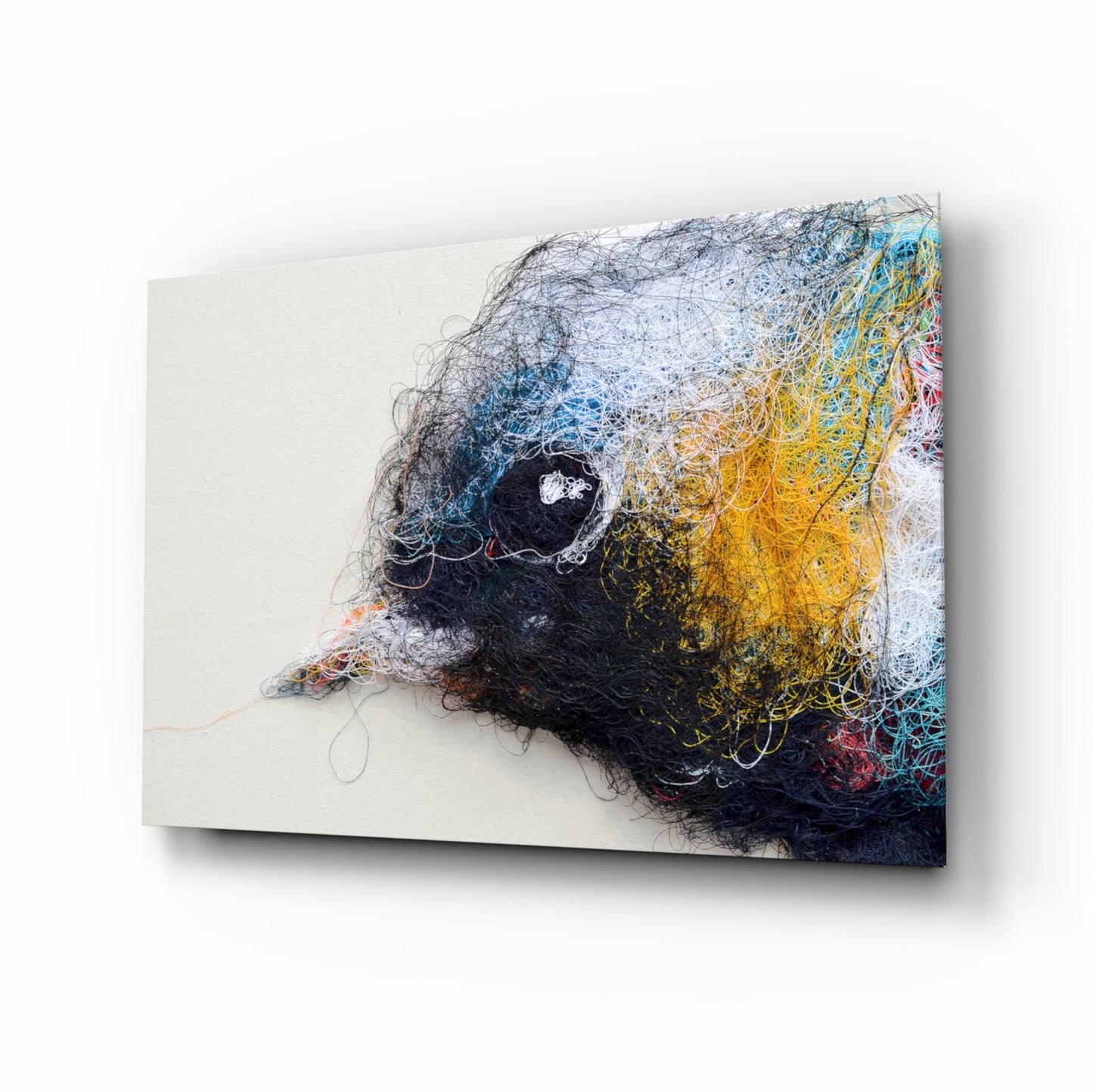 Tiny bird embroidery glass wall art - sparrow in thread art style on cream ground, tempered glass