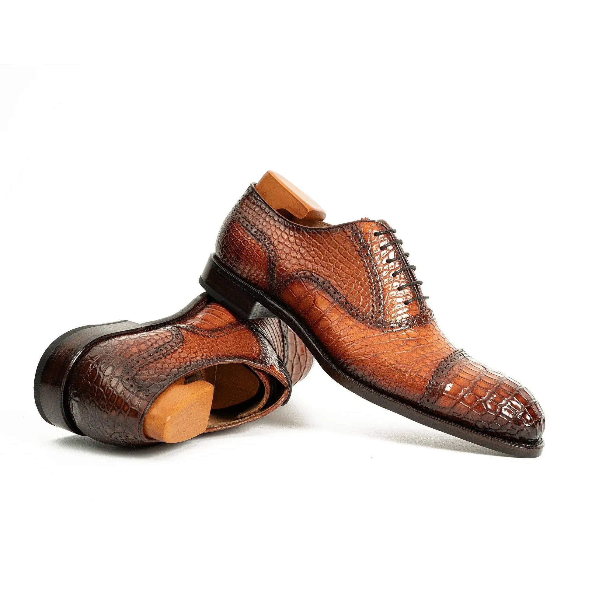 pair of brown exotic leather oxford shoes