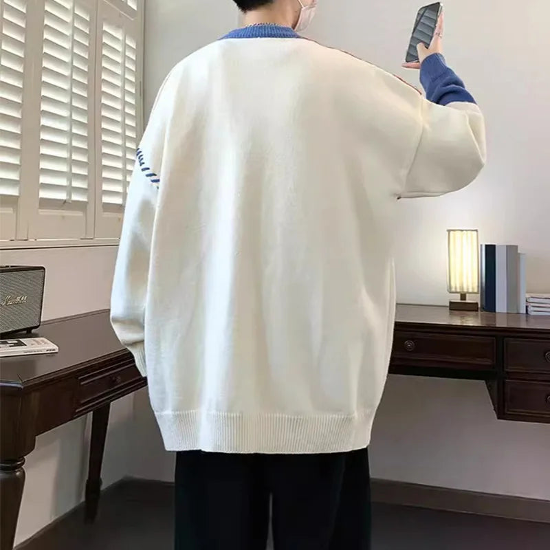 patchwork color block knit sweater laid flat
