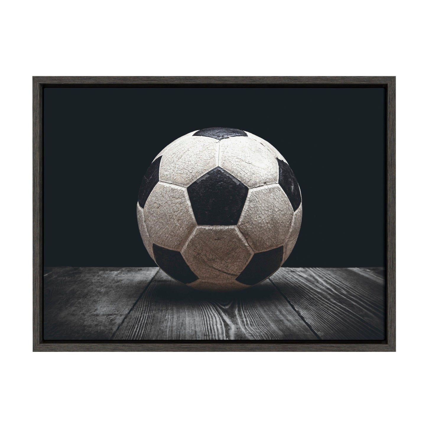 Vintage soccer ball framed canvas wall art in a gray frame, ready to hang