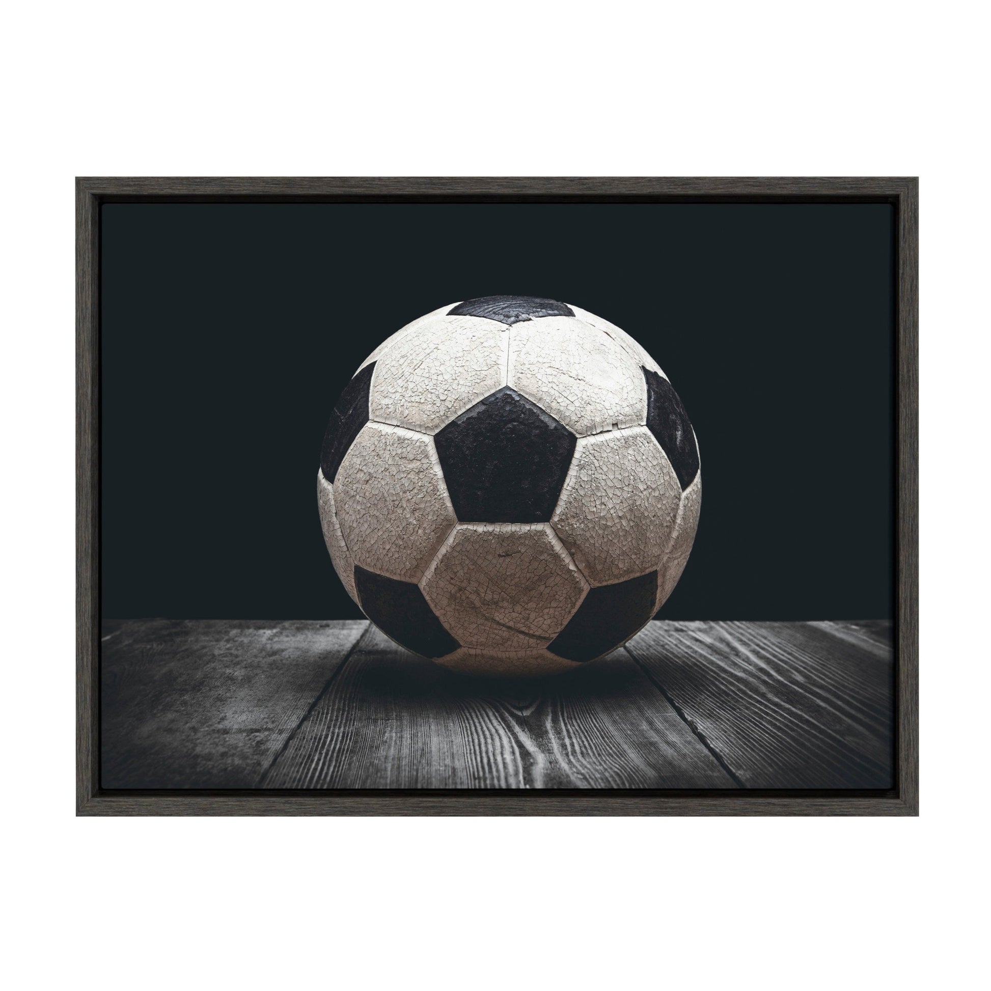 Vintage soccer ball framed canvas wall art in a gray frame, ready to hang