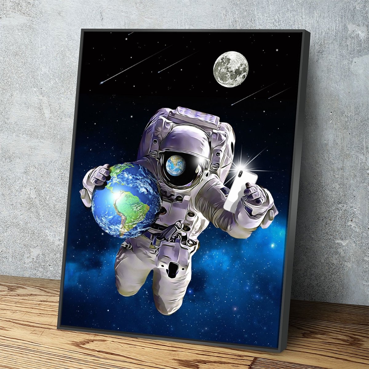 Save The World Selfie astronaut canvas wall art in a gallery-wrapped frame above a desk
