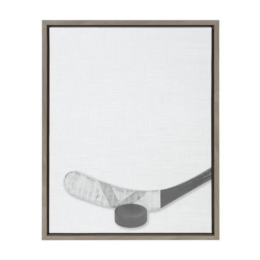 Hockey stick and puck framed canvas wall art in gray frame, easy to hang