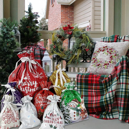 small medium and large Christmas gift bags on porch