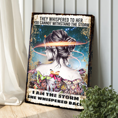 I Am the Storm butterfly woman canvas leaning against a white paneled wall beside a plant