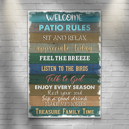 Tall patio rules canvas sign printed as stacked teal, green, blue and brown planks, on a white brick wall