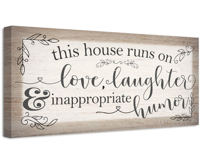 This House Runs on Love, Laughter and Inappropriate Humor quote canvas wall art on a wood frame