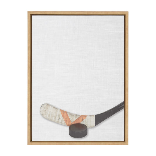 Hockey stick and puck framed canvas wall art in natural wood frame, easy to hang