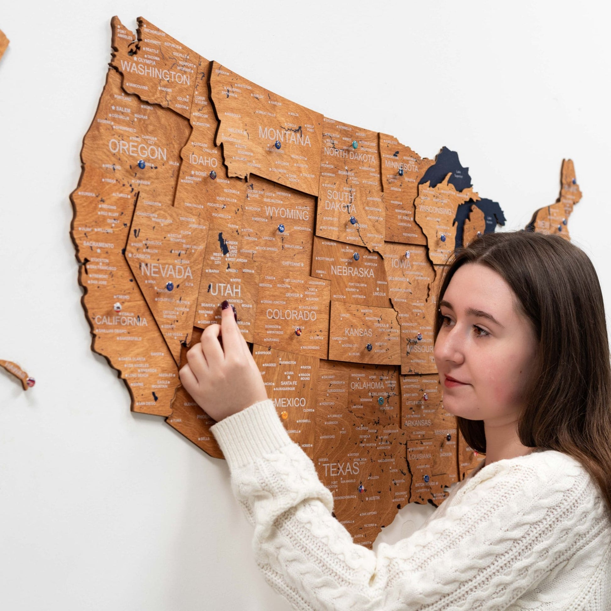 Wood 3D USA map wall art in oak finish on a wall