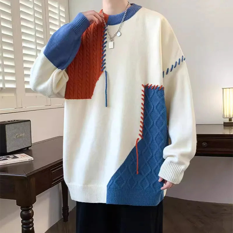 youth wearing orange blue patch knit sweater
