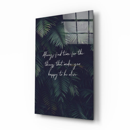 White handwritten happiness quote over dark green palm leaves, tall glass wall art on a white background