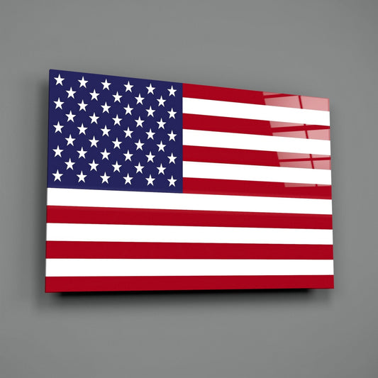 Classic American flag glass wall art on a gray wall, light catching the glossy glass surface